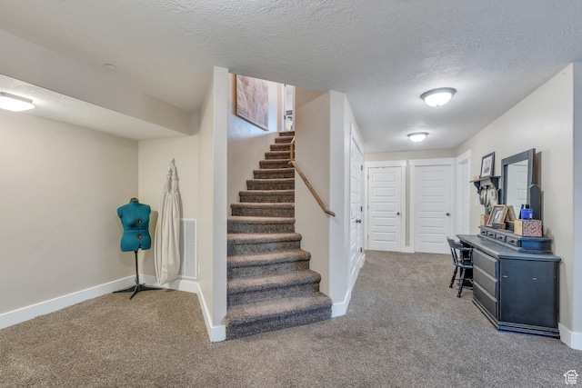 80 Pheasant, Elk Ridge, UT 84651 - staircase featuring carpet flooring, a textured ceiling, and baseboards