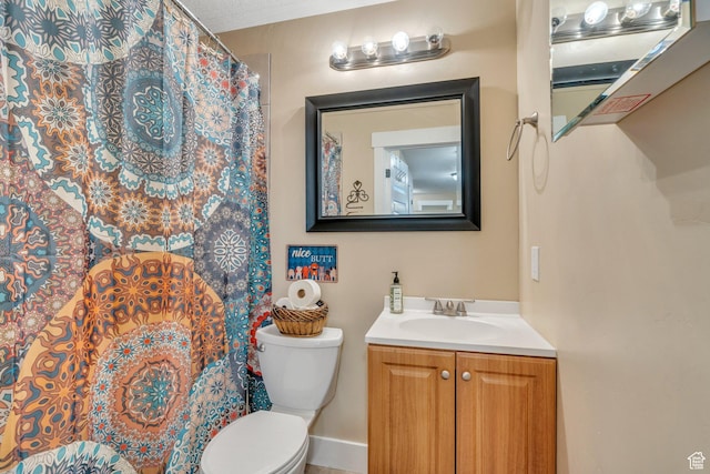80 Pheasant, Elk Ridge, UT 84651 - bathroom featuring toilet, vanity, and a shower with curtain