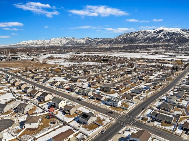 2588 S 1000 W, Nibley, UT 84321 - aerial view of property and surrounding area featuring a mountain backdrop and nearby suburban area