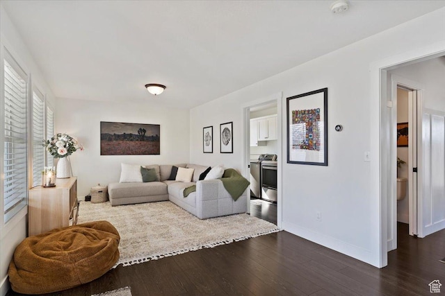 2588 S 1000 W, Nibley, UT 84321 - living area with dark wood-style flooring and baseboards