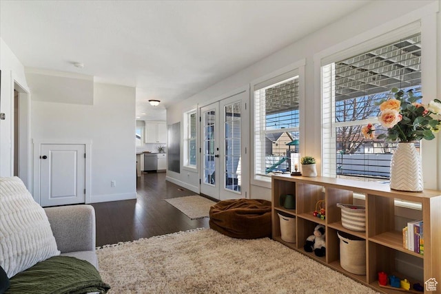 2588 S 1000 W, Nibley, UT 84321 - sitting room with dark wood finished floors, french doors, and baseboards