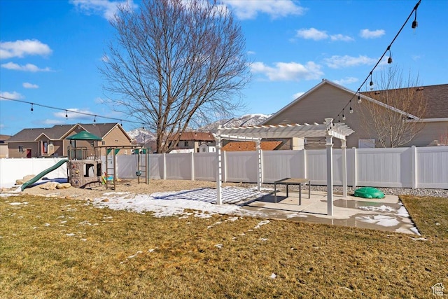 2588 S 1000 W, Nibley, UT 84321 - view of yard featuring a playground, a pergola, and a patio area