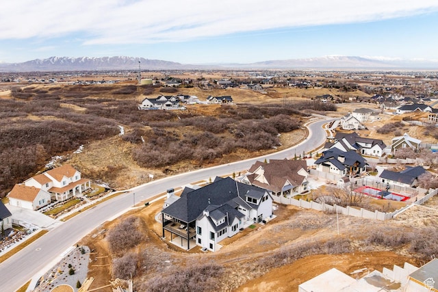 birds eye view of property with a residential view and a mountain view