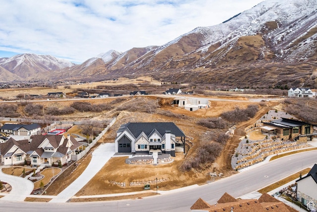 bird's eye view with a residential view and a mountain view