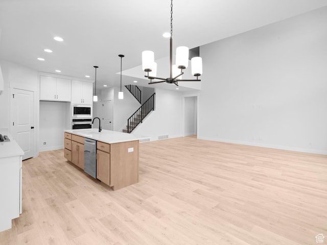 1171 W 800 S Unit 38, Spanish Fork, UT 84660 - kitchen with light wood finished floors, stainless steel appliances, open floor plan, recessed lighting, and hanging light fixtures
