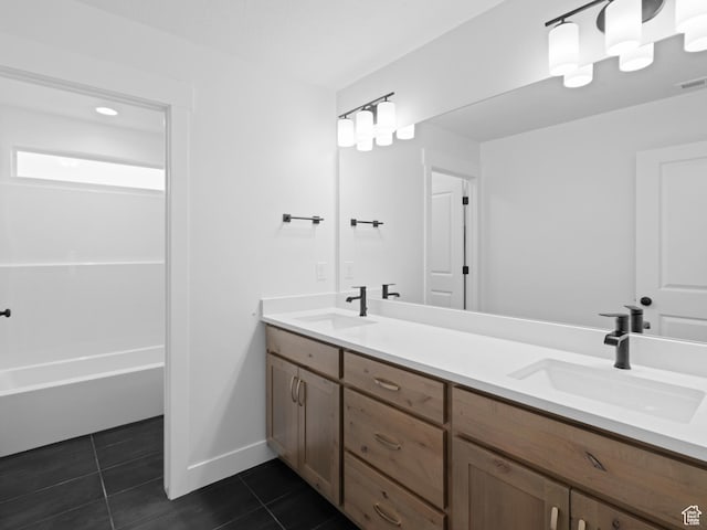 1171 W 800 S Unit 38, Spanish Fork, UT 84660 - bathroom featuring double vanity, tile patterned flooring, baseboards, and a sink