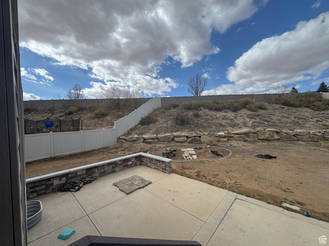 view of patio featuring a fenced backyard
