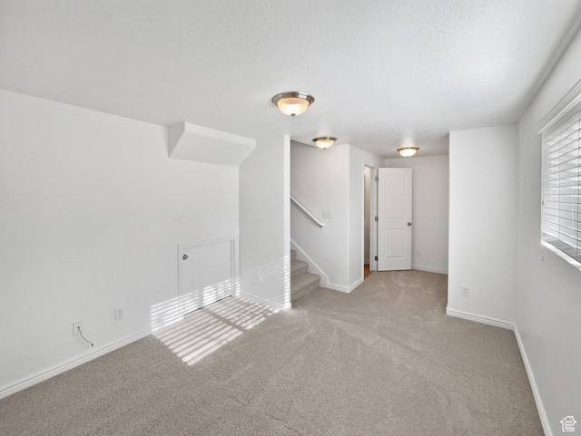 307 W Park View Ln, Spanish Fork, UT 84660 - empty room featuring light colored carpet, stairway, baseboards, and a textured ceiling
