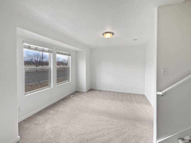307 W Park View Ln, Spanish Fork, UT 84660 - spare room featuring carpet floors, baseboards, and a textured ceiling