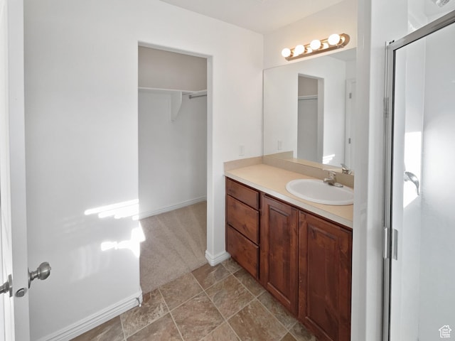 307 W Park View Ln, Spanish Fork, UT 84660 - full bathroom with stone finish flooring, an enclosed shower, vanity, and baseboards