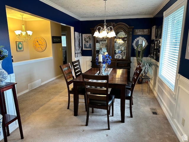 371 S Willard Peak Rd S, Mantua, UT 84324 - carpeted dining space featuring visible vents, ornamental molding, wainscoting, a notable chandelier, and a textured ceiling