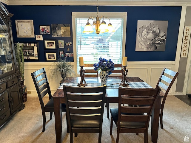 371 S Willard Peak Rd S, Mantua, UT 84324 - dining area featuring light carpet, a chandelier, wainscoting, and crown molding
