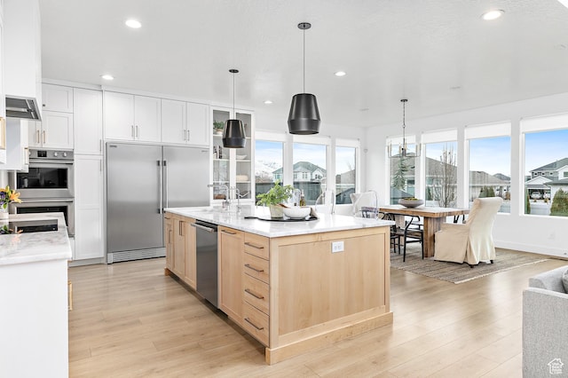 1228 E 1030 N, American Fork, UT 84003 - kitchen with pendant lighting, recessed lighting, appliances with stainless steel finishes, light wood-style floors, and light brown cabinets