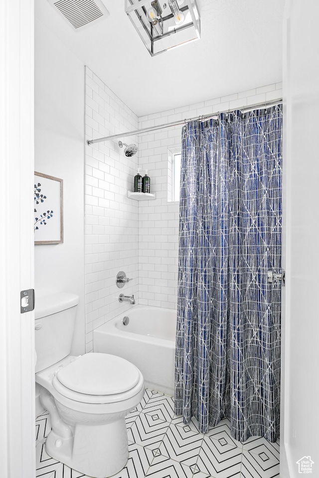 1228 E 1030 N, American Fork, UT 84003 - full bathroom featuring tile patterned flooring, visible vents, toilet, and shower / bath combo with shower curtain