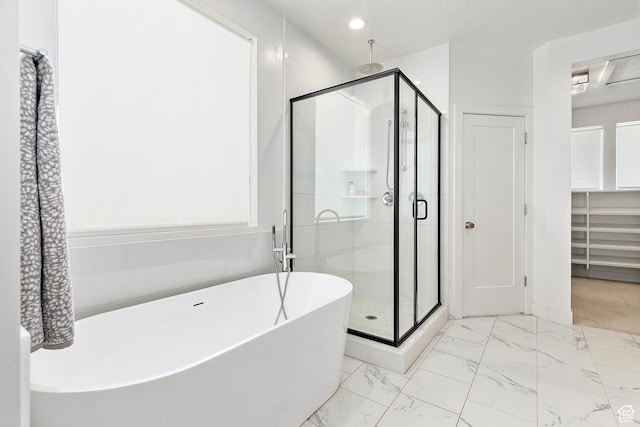 1228 E 1030 N, American Fork, UT 84003 - full bathroom featuring a shower stall, a freestanding tub, marble look tile flooring, and recessed lighting