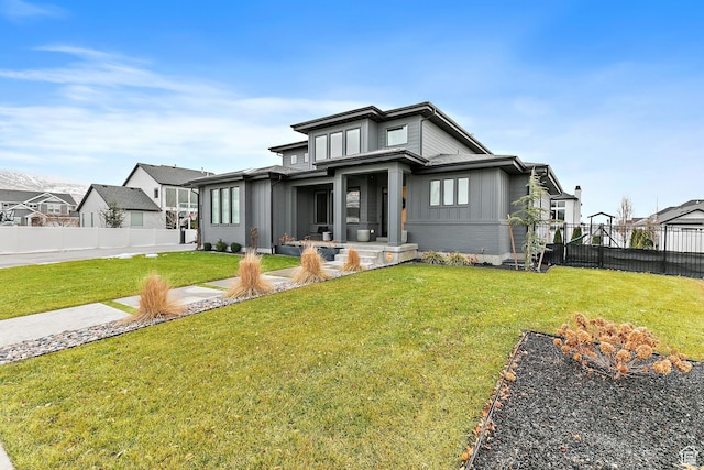 1228 E 1030 N, American Fork, UT 84003 - view of front of home featuring fence, board and batten siding, and a front yard