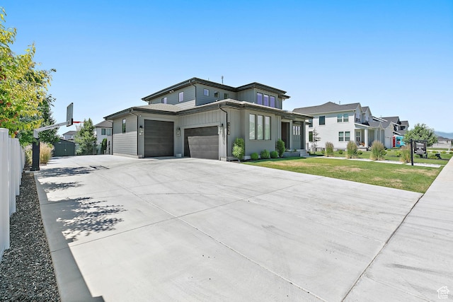 1228 E 1030 N, American Fork, UT 84003 - view of front of house featuring a residential view, concrete driveway, and an attached garage