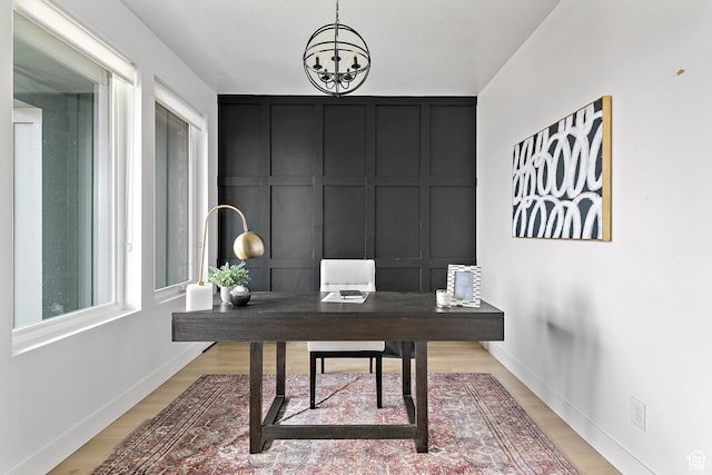 1228 E 1030 N, American Fork, UT 84003 - office featuring an inviting chandelier, light wood-style flooring, baseboards, and a decorative wall
