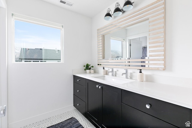 1228 E 1030 N, American Fork, UT 84003 - bathroom featuring visible vents, vanity, and baseboards