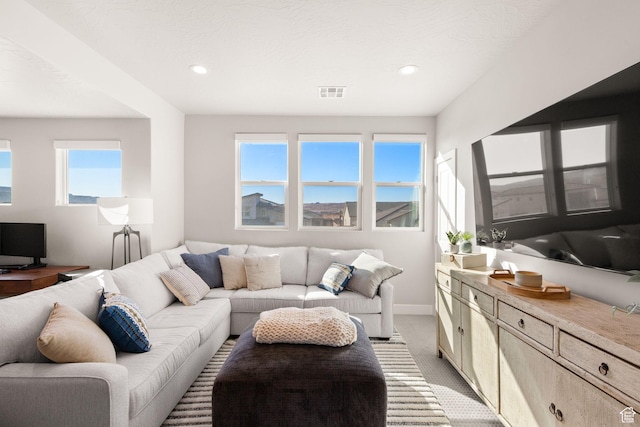 4712 W 2820 S, Hurricane, UT 84737 - living area featuring light colored carpet, baseboards, and recessed lighting