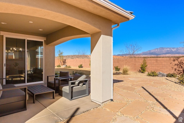 4712 W 2820 S, Hurricane, UT 84737 - view of patio featuring a fenced backyard and a mountain view