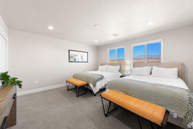 4712 W 2820 S, Hurricane, UT 84737 - bedroom with light carpet, baseboards, recessed lighting, and a textured ceiling