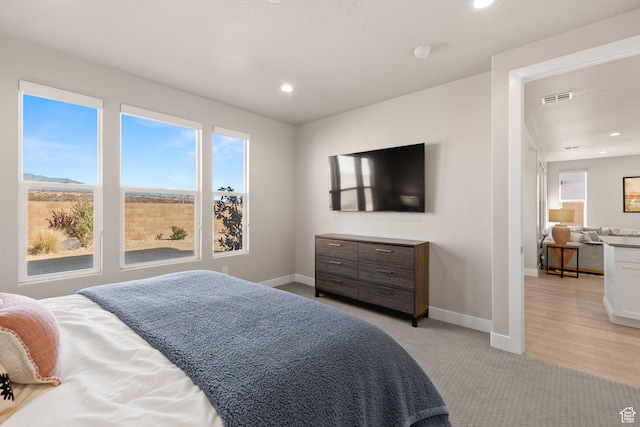 4712 W 2820 S, Hurricane, UT 84737 - bedroom featuring light colored carpet, baseboards, and recessed lighting