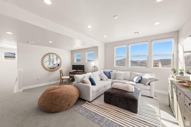 4712 W 2820 S, Hurricane, UT 84737 - living room featuring light carpet, recessed lighting, baseboards, and a textured ceiling