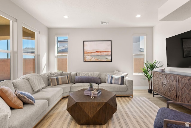 4712 W 2820 S, Hurricane, UT 84737 - living area with light wood-style flooring, recessed lighting, and baseboards