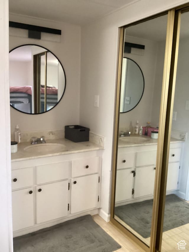 255 N 1st St E, Manila, UT 84046 - bathroom with wood finished floors and vanity