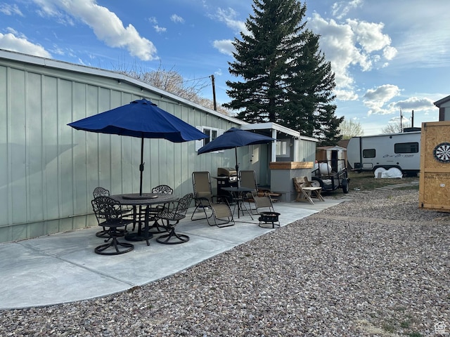 255 N 1st St E, Manila, UT 84046 - view of patio with an outdoor structure and a storage shed
