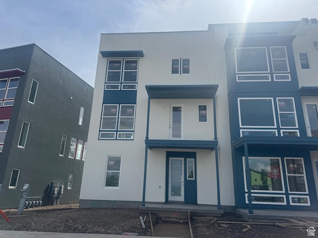 view of front of home featuring stucco siding
