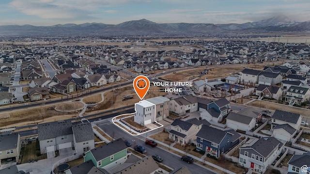 aerial view with a residential view and a mountain view