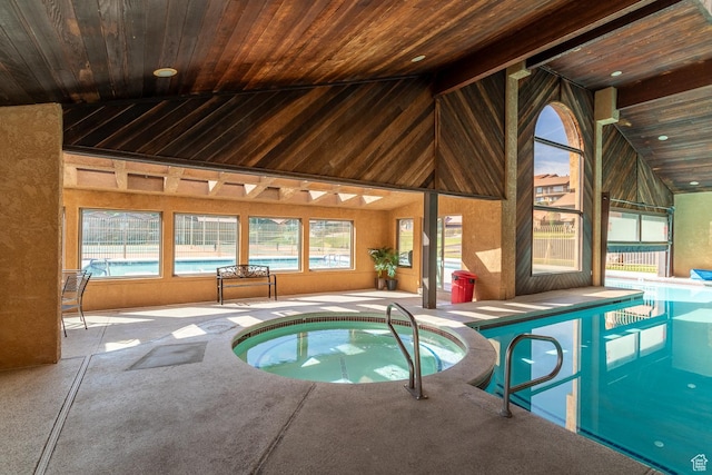 pool featuring an indoor hot tub