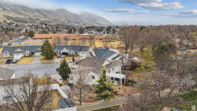 drone / aerial view featuring a mountain view and a residential view