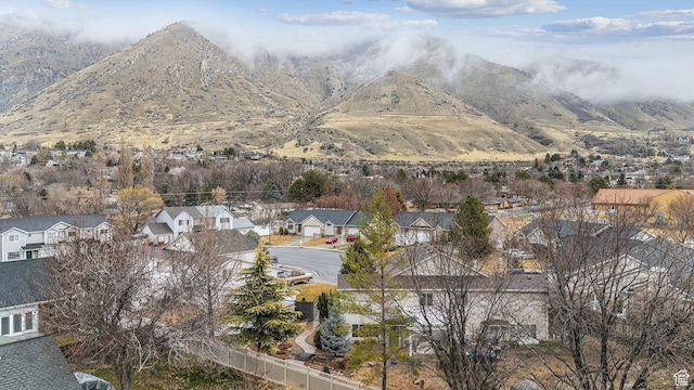 property view of mountains featuring a residential view