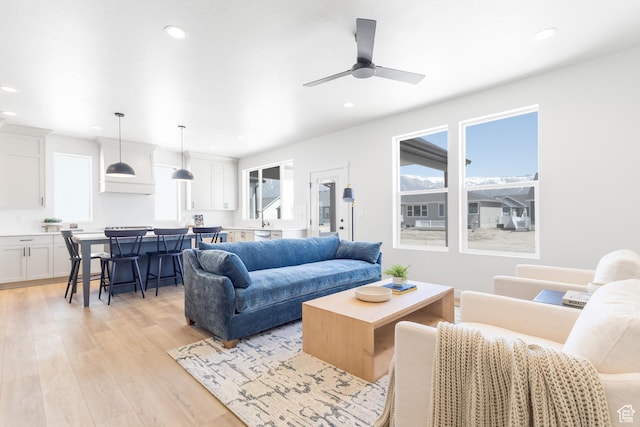 3062 N 2875 W Unit 24, Plain City, UT 84404 - living area with recessed lighting, a ceiling fan, and light wood finished floors