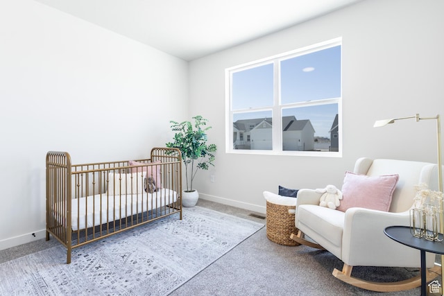 3062 N 2875 W Unit 24, Plain City, UT 84404 - carpeted bedroom featuring baseboards and a crib