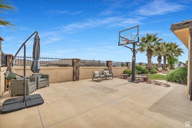view of patio / terrace with fence