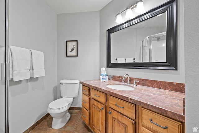 1808 W Fox Bay Dr Unit B304, Heber City, UT 84032 - full bathroom featuring a shower with door, toilet, vanity, tile patterned flooring, and baseboards