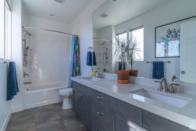 full bath with a sink, visible vents, toilet, and shower / bath combo