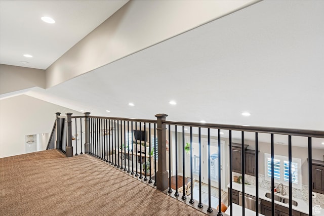 hall with recessed lighting
