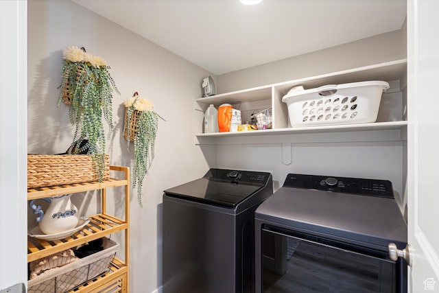 laundry area with separate washer and dryer and laundry area