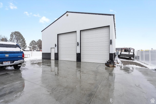 detached garage with fence