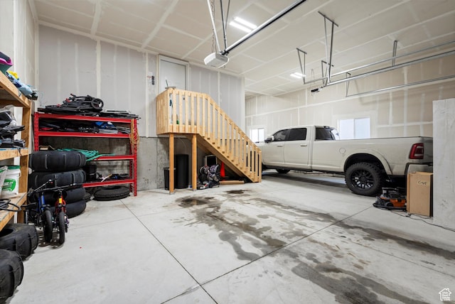 garage featuring a garage door opener