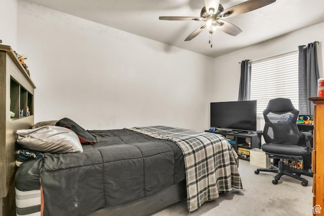 bedroom with carpet floors and a ceiling fan