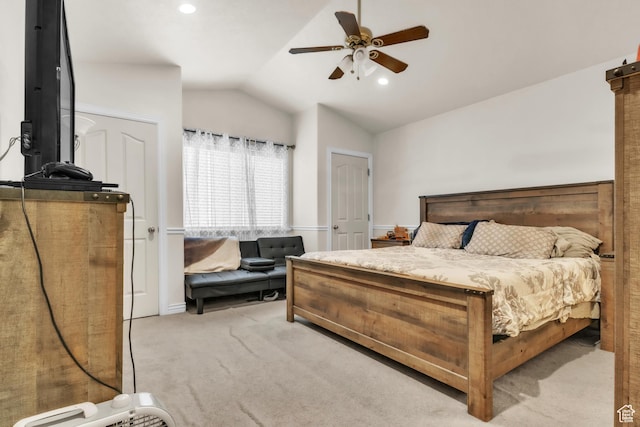carpeted bedroom with a ceiling fan, lofted ceiling, and recessed lighting
