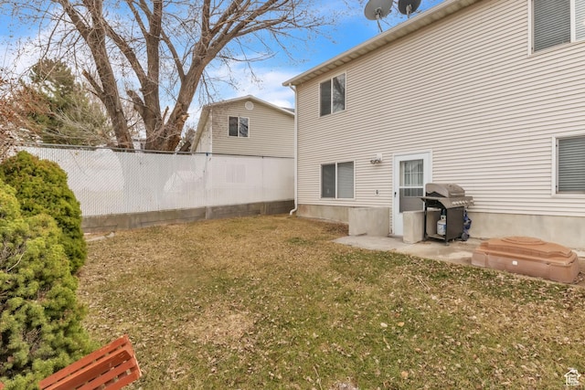exterior space with a yard and fence