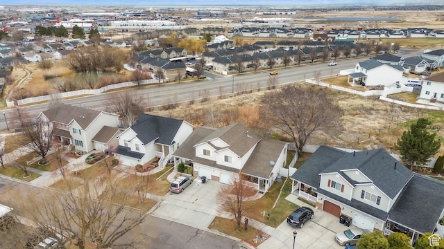 birds eye view of property with a residential view
