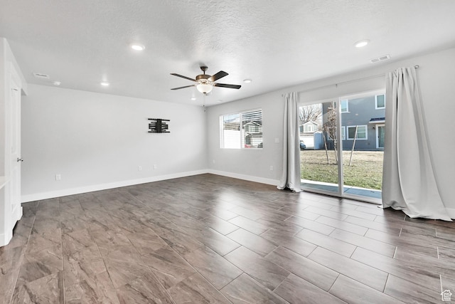 6512 S 390 E, South Weber, UT 84405 - unfurnished room featuring baseboards, visible vents, a ceiling fan, a textured ceiling, and recessed lighting